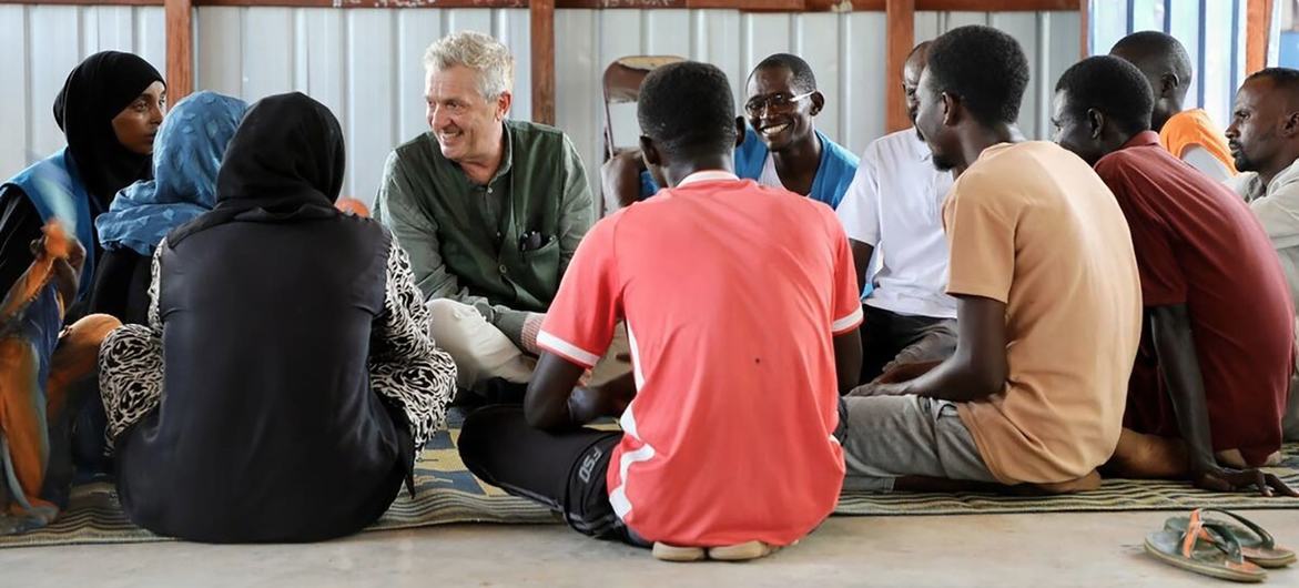 UN High Commissioner for Refugees, Filippo Grandi, meets a group of young Sudanese refugees in a refugee settlement in Aweil, South Sudan.