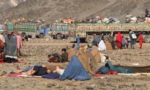 Afghan women with their families arrive from Pakistan with their belongings at the Torkham crossing point, facing a bleak future where women and girls' rights have become severely restricted.