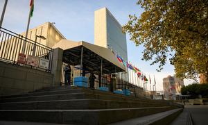 A view of the entrance to the UN Headquarters. In the background is the Secretariat building.