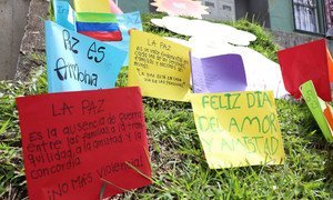 Messages of peace written by children are placed in communes in the city of Medellín in Colombia.