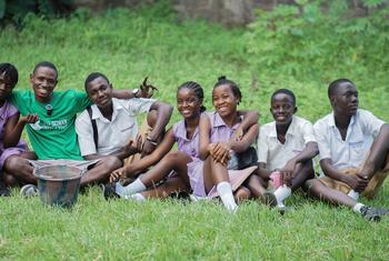 In Sierra Leone, young farmer and climate advocate Michael Nabieu (green t-shirt, second from the left) empowers students to turn waste into opportunity – advancing the spirit of social inclusion and sustainable development.