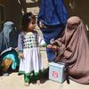 A child is vaccinated against polio during a polio mobillisation campaign in Kandahar, Afghanistan.