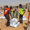 Food is distributed in Omdurman, close to the Sudanese capital, Khartoum.