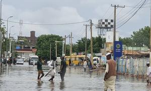 People affected by heavy rainfall and flooding in Kassala, eastern Sudan.