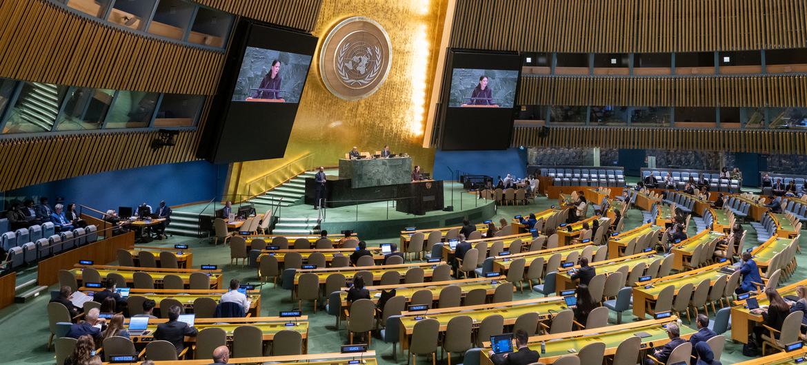 General Assemby President Annalena Baerbock (at podium and on screens) addresses the high-level conference of the General Assembly on the situation of Rohingya Muslims and other minorities in Myanmar.