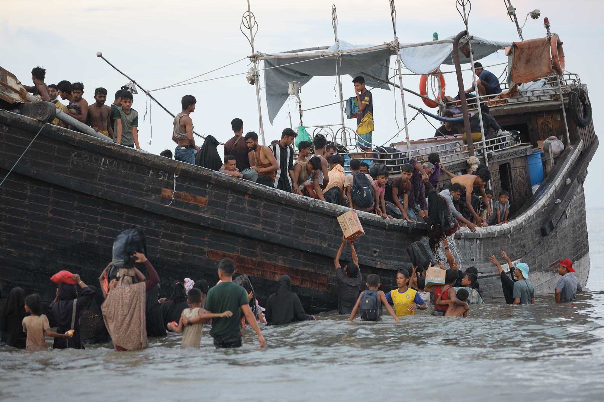 Rohingya refugees arrive in North Aceh, Indonesia, after a dangerous sea voyage from Bangladesh. Rohingya refugees arrive in North Aceh, Indonesia, after a dangerous sea voyage from Bangladesh.
