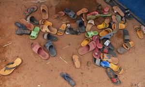 There has been a sharp rise in attacks against civilians in Burkina Faso. Pictured here, slippers outside a communal space at a camp for displaced persons.