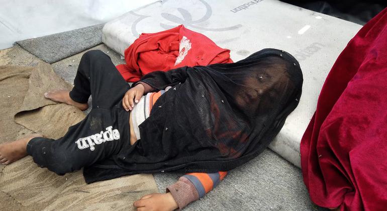 The Moain Abu Asra family has to live in a broken tent where flies bands spread the risk of disease.
