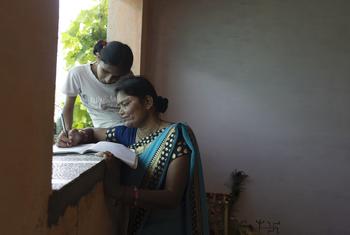 45 year old Nisha Chauhan completed her class 12 after being a class 5 drop out. Her adopted daughter Sakshi Chauhan who is in 7th Standards helps her in studies. 