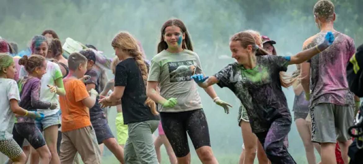 Children play at a UNESCO-run summer camp in Ukraine