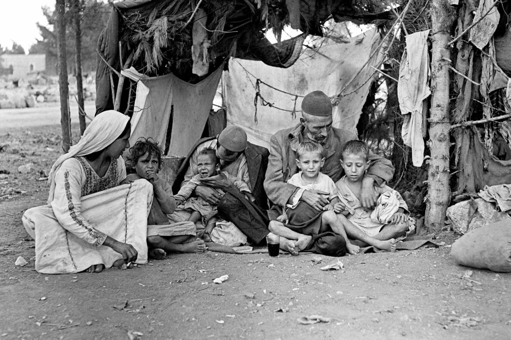 A refugee family in Khan Yunis in the Gaza area of Southern Palestine (1948-1949) A refugee family in Khan Yunis in the Gaza area of Southern Palestine (1948-1949)
