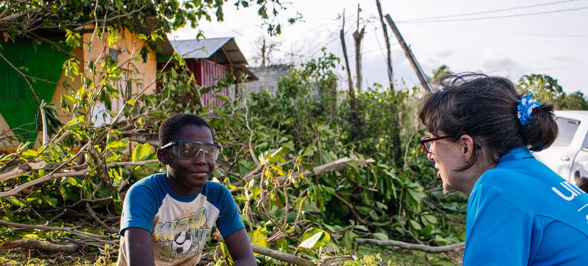 A boy receives support from a UNICEF worker in St. Elizabeth, Jamaica. A boy receives support from a UNICEF worker in St. Elizabeth, Jamaica.