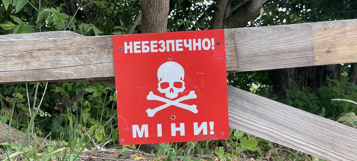 Sign “Beware of landmines” in Ukraine