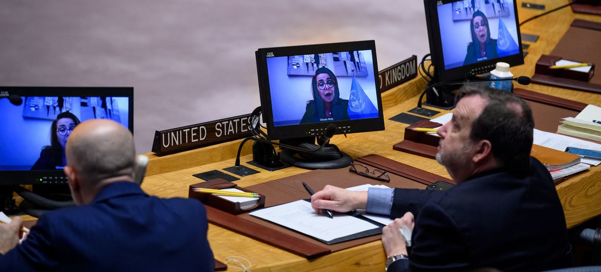 Ghada Fathi Waly (on screen), Executive Director of the United Nations Office on Drugs and Crime, presents a summary of the Security Council meeting on peace and security in Africa. 