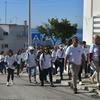 Comunidades locais praticam suas rotas de evacuação em caso de tsunami em Portugal.