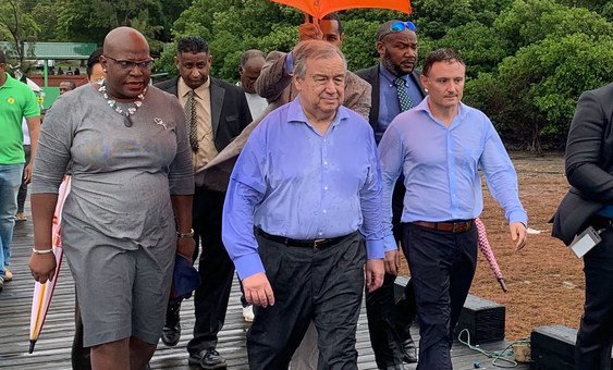 The UN Resident Coordinator for Barbados and the Organisation of Eastern Caribbean States (OECS), Didier Trebucq (right) accompanies UN Secretary General, António Guterres (centre) on a trip to St Lucia.