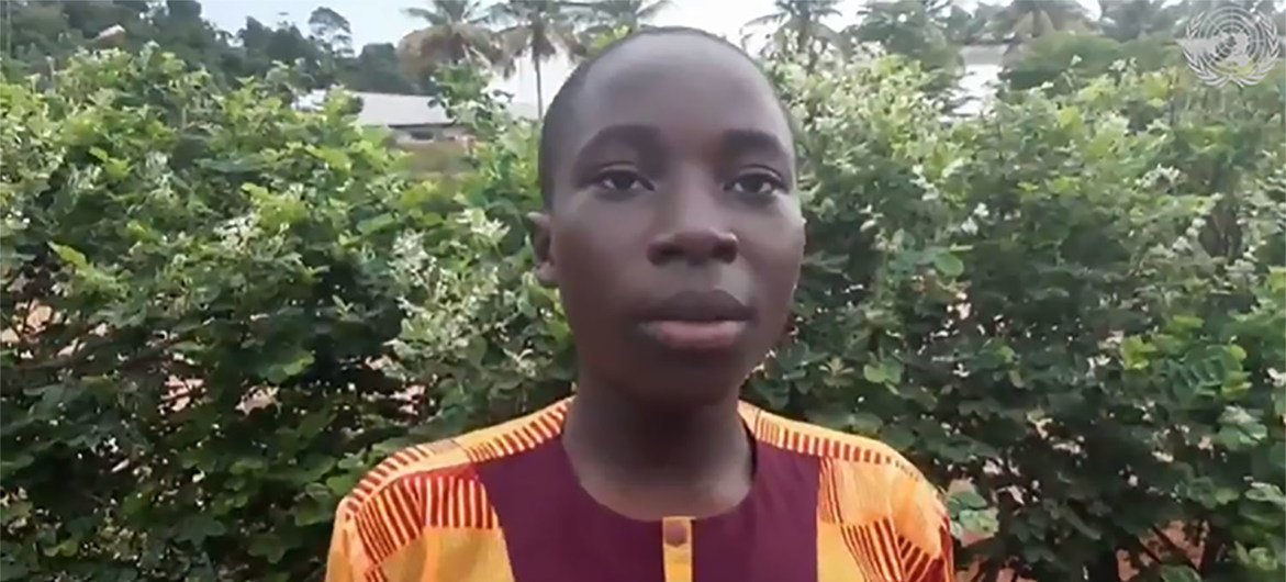 Junior, a teenage youth activist from Côte d’Ivoire, speaks via videolink to the UN Human Rights Council about protecting the environment.