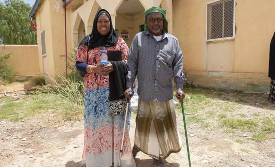 UNSOM Human Rights Officer, Sia Mawalla (left), and leader of a visiting UN team, poses for a photo with a civil society representative in Ceerigaabo, Sanaag region