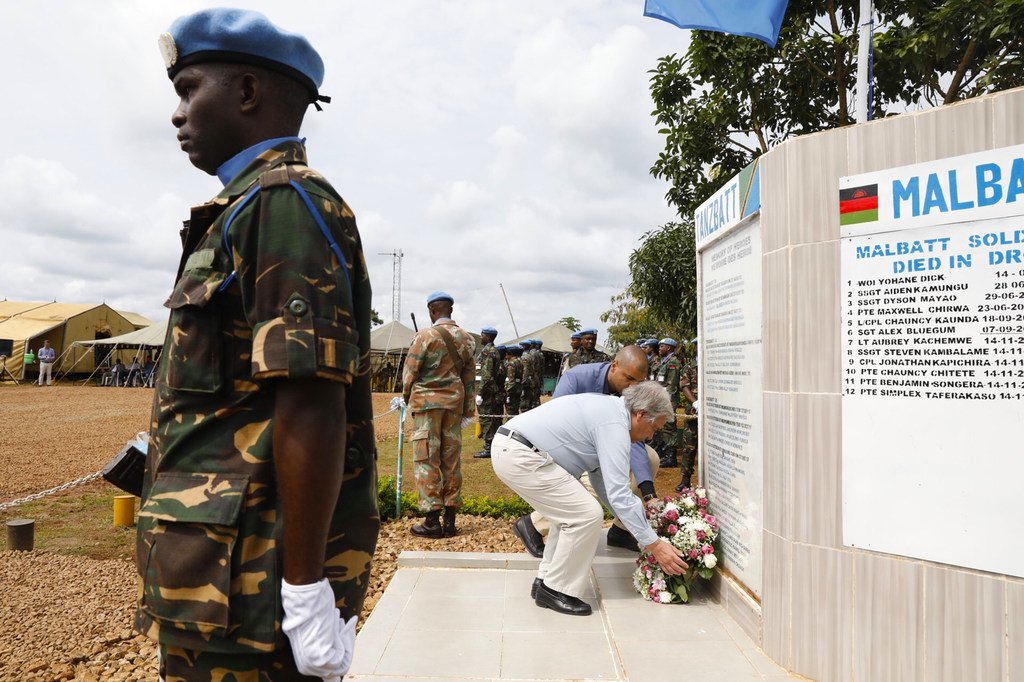 The UN Secretary-General António Guterres lays a wreath for fallen peacekeepers in Mavivi town in the eastern Democratic Republic of the Congo on 1 September 2019.