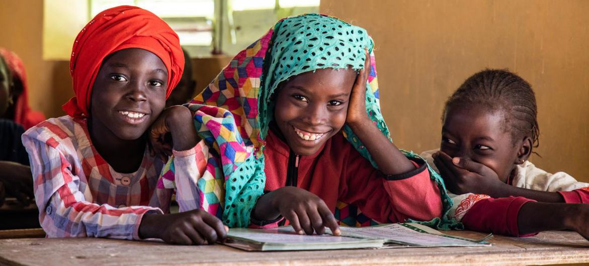 Girls study together at school in Senegal.