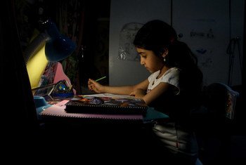 An eight-year-old child studies at home in Ahavaz, Iran, as schools are closed due to COVID-19. Many pupils in disadvantaged areas of the city do not have electronic devices and cannot access virtual lessons.