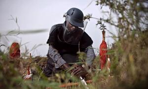 A deminer at work in the Democratic Republic of the Congo.