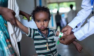 A young girl undergoes a health-check  at a health centre in the Tigray region of northern Ethiopia.