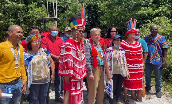 UN Secretary-General António Guterres (centre) meets  with members of agricultural cooperatives led by indigenous women and men in Pierre Kondre- Redi Doti Village, in Suriname's tropical forest belt.