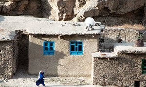 A woman walks in Badakhshan, a province located in north-eastern Afghanistan.
