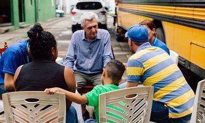 UNHCR High Commissioner Filippo Grandi talks with a Guatemalan family at a shelter in Tapachula, Mexico, on September 28, 2019.