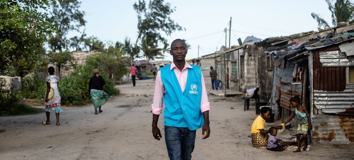 Luis Jose Faife walks in the streets of a settlement in Beira, Mozambique, that was devastated by cyclone Idai in 2019.