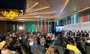 UN  Deputy Secretary-General Amina J. Mohammed sits on the podium at the conference in Dakar, Senegal, on development and debt. (2 December 2019)