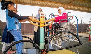 A 9-year-old girl plays on a seesaw in a new inclusive playground built in her school in Za’atari Refugee Camp, Jordan.