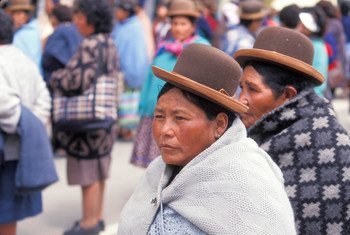 Women walk in the street in La Paz, Bolivia.