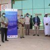 المنظمة الدولية للهجرة تساعد في فحص موظفي مطار الخرطوم الدولي لتحقق ما إذا كانت تظهر عليهم أعراض كوفيد-19، في العاصمة السودانية الخرطوم. 