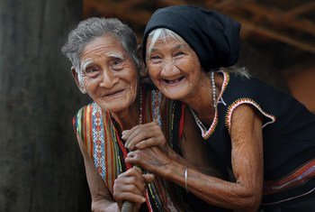 In Viet Nam, an elderly couple in their 80s enjoying life. 