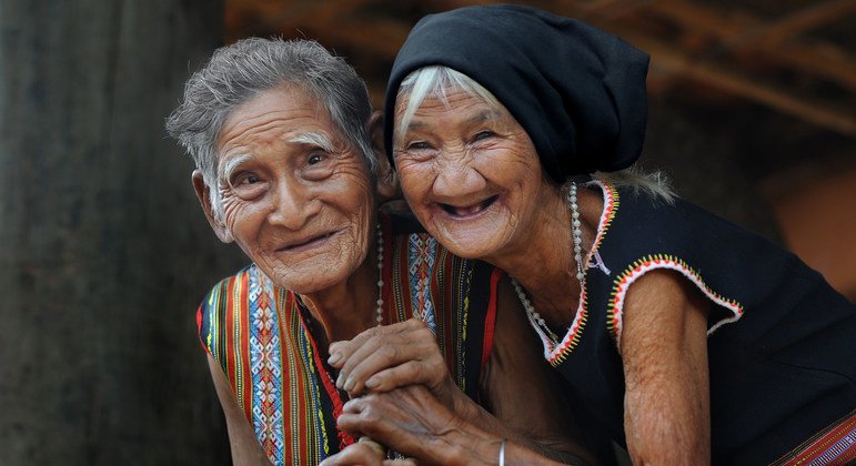 In Viet Nam, an elderly couple in their 80s enjoying life. 