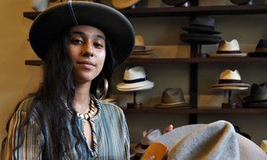 New Orleans-based Kai Bussant repairs and refurbishes hats.