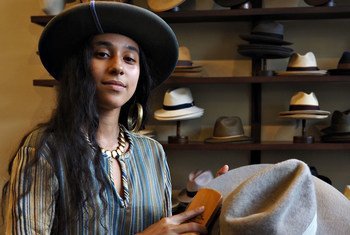 New Orleans-based Kai Bussant repairs and refurbishes hats.