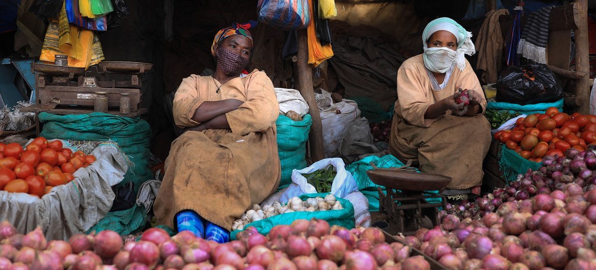 Street vendors sell vegetables at a market in Addis Ababa, Ethiopia.