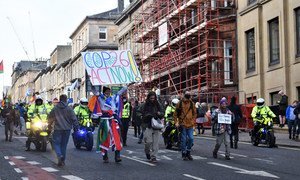 Civil organizations demonstrate at the COP26 Climate Conference in Glasgow, Scotland.