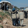 Des travailleurs humanitaires arrivent dans le camp d'Atma, dans la région d'Idlib, en Syrie (photo d'archives).