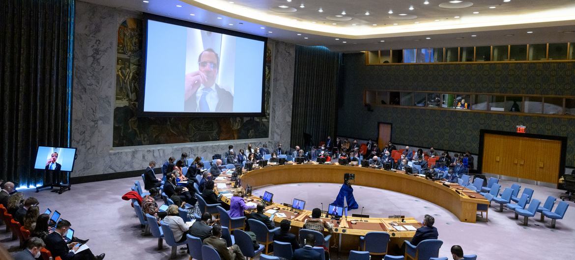 Rafael Mariano Grossi (on screen), Director General of the International Atomic Energy Agency, briefs members of the UN Security Council the situation in Ukraine.