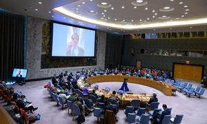 Rafael Mariano Grossi (on screen), Director General of the International Atomic Energy Agency, briefs members of the UN Security Council the situation in Ukraine.