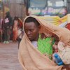 Wakimbizi wa Burundi wanaorejea nchini mwao kutoka Tanzania wakiwa kwenye kituo cha mpito cha Mabanda katika jimbo la Makamba nchini Burundi. (24 Aprili 2018)