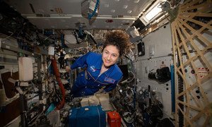 NASA astronaut and Expedition 62 Flight Engineer Jessica Meir hovers for a portrait in the weightless environment of the International Space Station.
