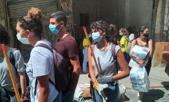 Youth volunteers help to clear the rubble clean-up in Mar-Mikhael, one of the areas worst hit by the blast.