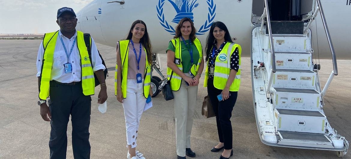 Rasha travaille en étroite collaboration avec des collègues en visite à Damas.