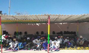 Survivors of the boat that capsized near the coast of Mauritania wait to receive assistance from Mauritanian authorities, the International Organization for Migration (IOM) and UNHCR.