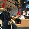 People wear face masks at China's Chengdu Shuangliu International Airport.